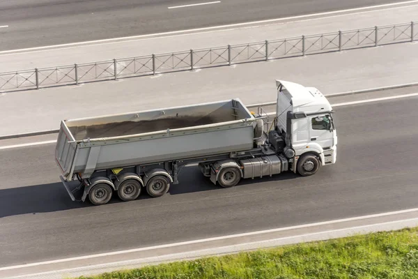 Truck with a trailer for bulk driving on the highway.