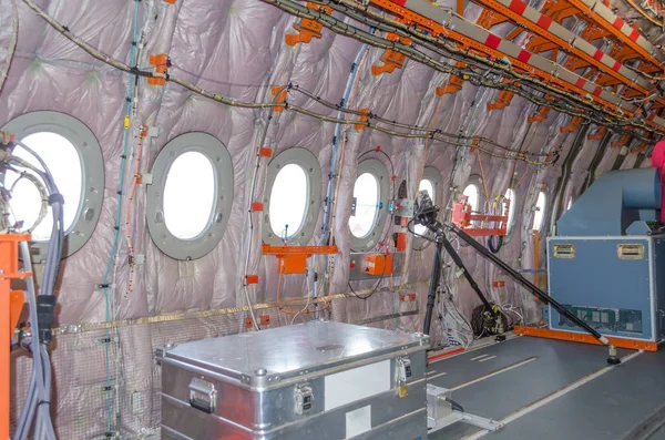 View on the cabin of the aircraft without interior trim, for test flights.