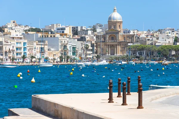 St Joseph 's Church Malta Msida Il-Kalkara view from the bay with boats . — стоковое фото