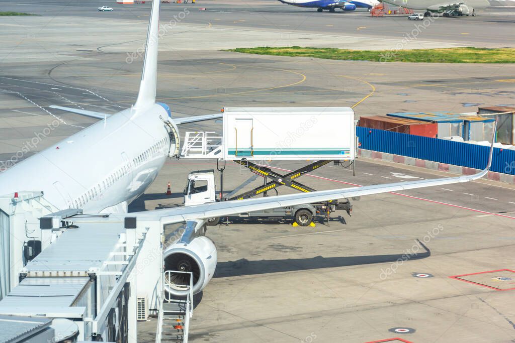 Loading food and food into the plane required for a commercial passenger flight