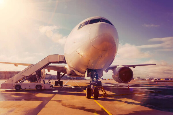 Airplane parked with gangway at the airport