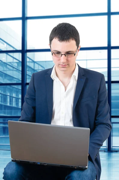 Young Businessman Wearing Glasses Waiting Plane Waching Foodbal Game Airport — Stock Photo, Image