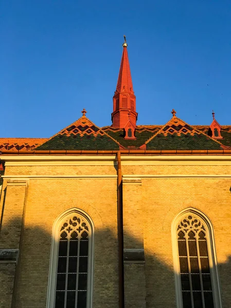 Old catholic Church in Novi Sad, Serbia, at sunset
