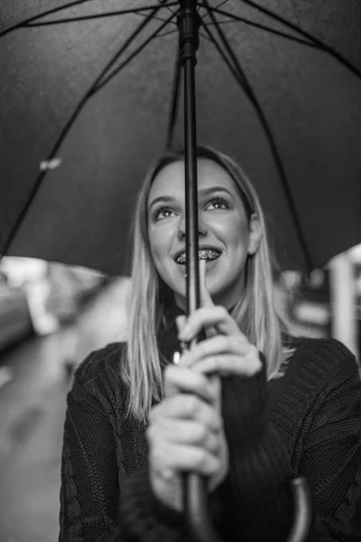 Stylish woman with umbrella