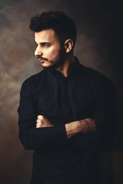 Portrait of young man in art studio