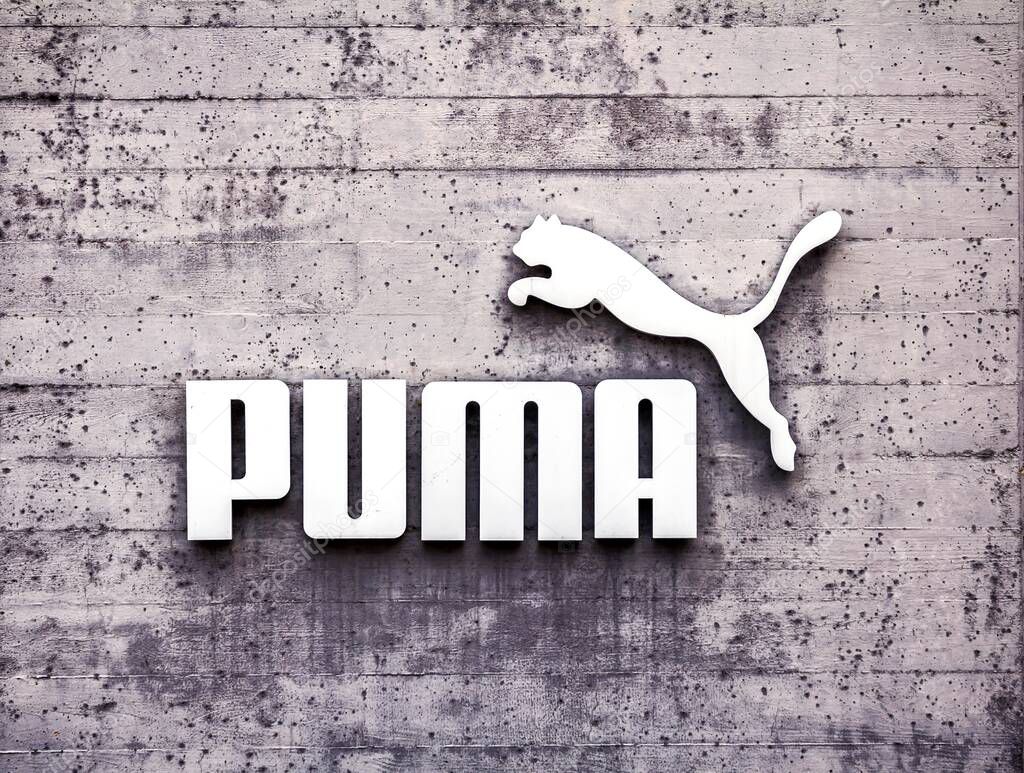 Herzogenaurach, Germany : Puma logo on a facade. Puma is a major german multinational company that produces athletic, casual footwear, sportswear, headquartered in Bavaria, Germany