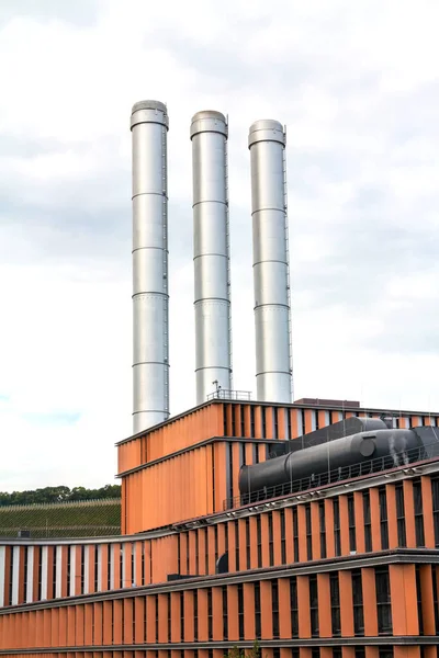 boiler house with chimneys on the roof of a high-rise building. Heating central