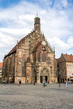 NURNBERG, GERMANY : Frauenkirche (Our Lady's church) at the Nuernberger Hauptmarkt (central square) in historical Nuremberg town. Nurnberg, Bavaria, Germany.  clipart
