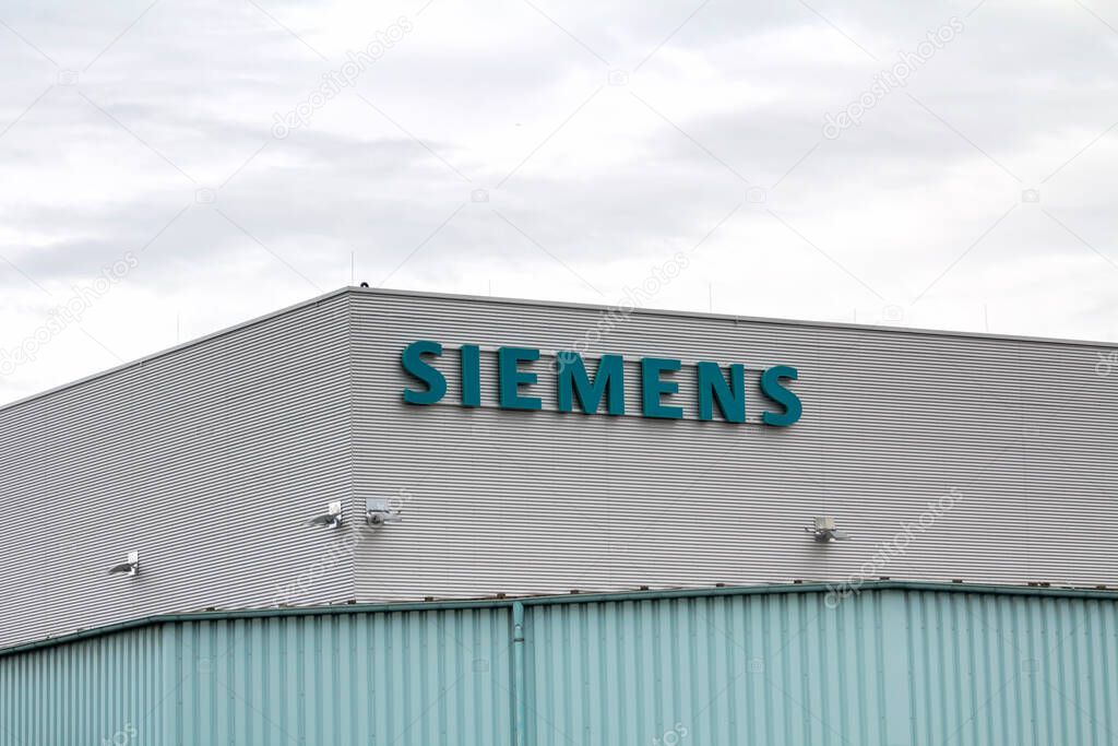 Nurnberg, Germany : Siemens logo on a wall of the Siemens building in central Nurnberg. Siemens is the largest engineering company in Europe
