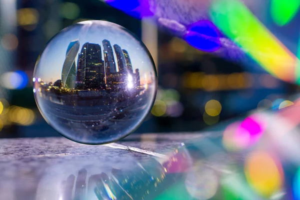 A picture of the city through a glass sphere Photo taken on a city street, autumn, September 2019, Moscow, Russia, sphere, Sky, houses