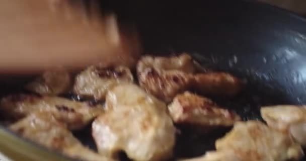 Faceless Cook Shaking Frying Pan Roasted Meat Close Slow Motion — Stock Video