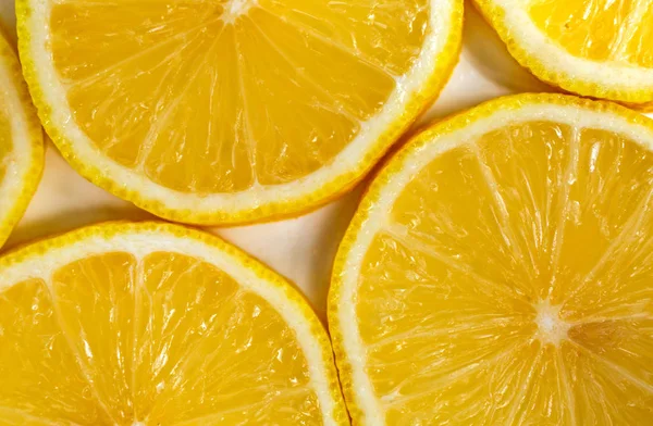 fresh sliced lemon on white background