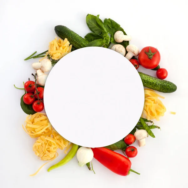 Wreath of Fine Food Products - Fresh Vegetables, Homemade Pasta and Spices on the White Backround with round copy space