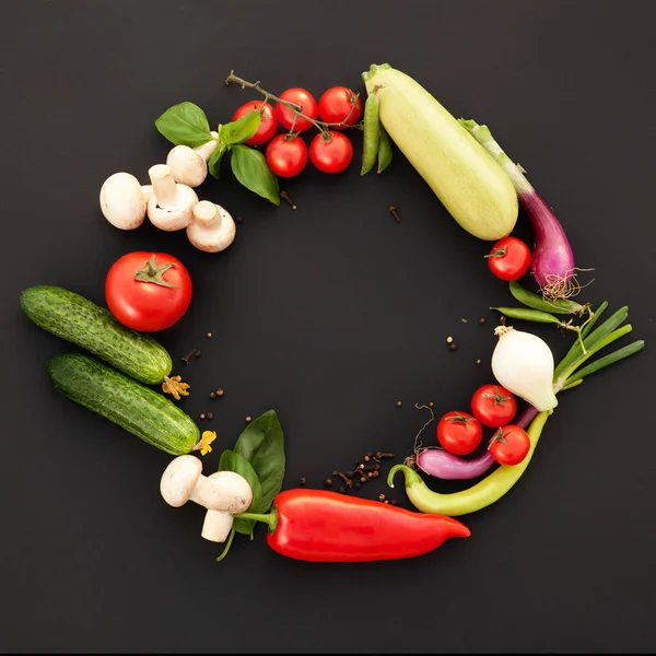 stock image Wreath of Fine Food Products - Fresh Vegetables, Homemade Pasta and Spices on the Black Background