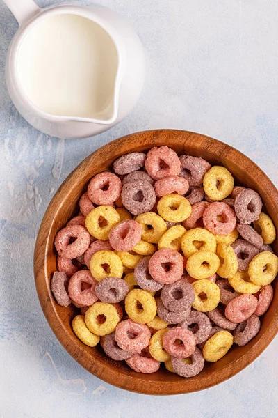Colorful cereal rings in bowl. Top view.