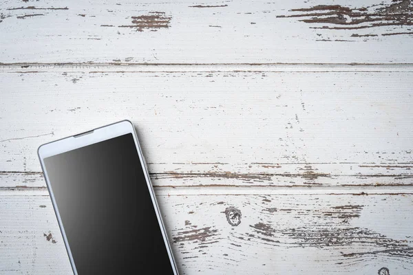 Smartphone Sobre Fondo Madera Blanca Cerca — Foto de Stock