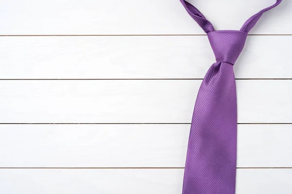 Close Shot Purple Necktie White Wooden Table — Stock Photo, Image