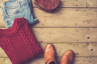 Kadının sıcak giysiler. Moda arka plan