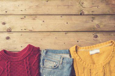 Kadının sıcak giysiler. Moda arka plan