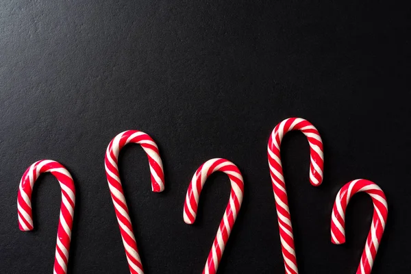 Candy canes background. Top view