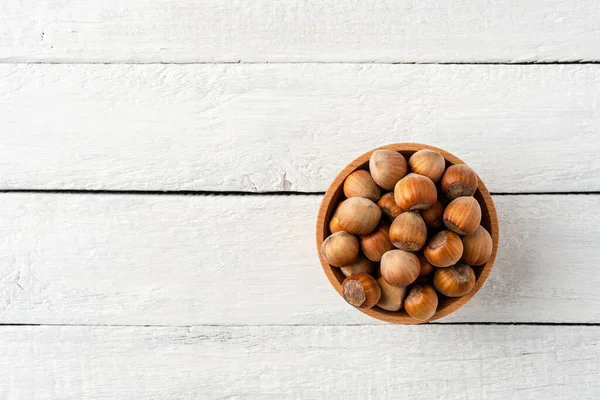 Overhead Shot Hazelnuts Bowl White Wooden Table Healthy Snacks — Stock Photo, Image