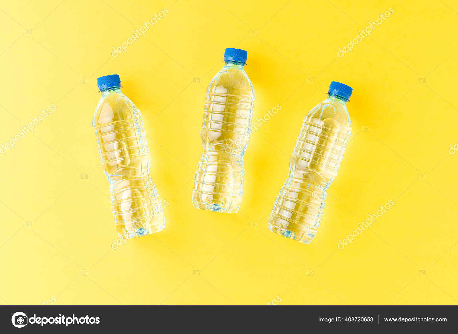 Mineral Water Small Plastic Bottles Yellow Background Top View