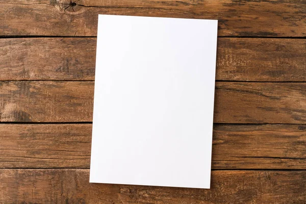 Leeres Weißes Papierblatt Auf Rustikalem Holztisch Ansicht Von Oben — Stockfoto