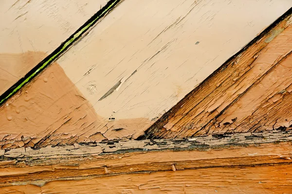Kırık ve peeling sarı ve kahverengi boya ile çok eski çizilmiş ahşap plakalar dokusuna