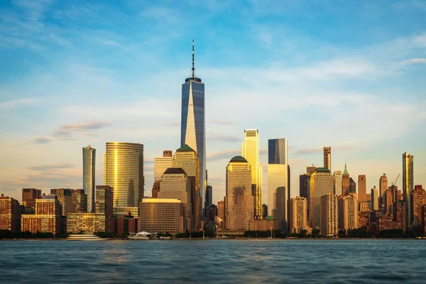 View to Lower Manhattan Skyline from Exchange Place in Jersey City at sunset.