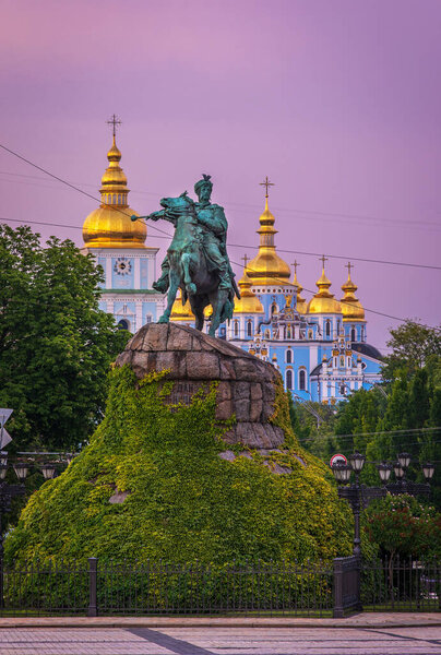 Scenic view on Hetman Bohdan Khmelnitsky monument and Saint Sophia's Cathedral on Sofia Square at sunset, Kyiv, Ukraine.