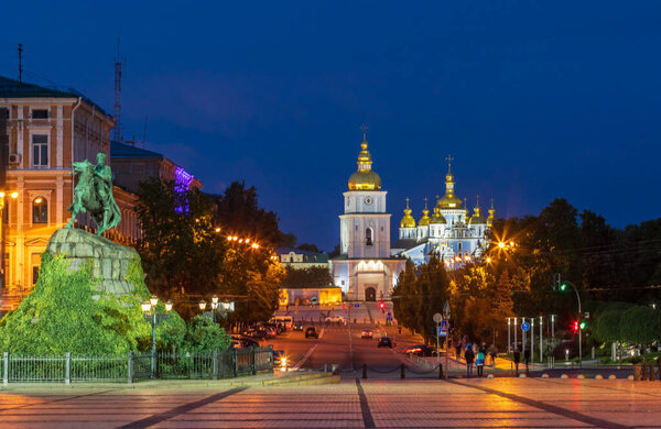 Scenic view on Hetman Bohdan Khmelnitsky monument and Saint Sophia's Cathedral on Sofia Square at sunset, Kyiv, Ukraine.
