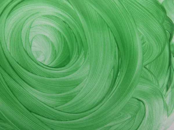 Fondo verde de pinceladas en forma de espiral —  Fotos de Stock