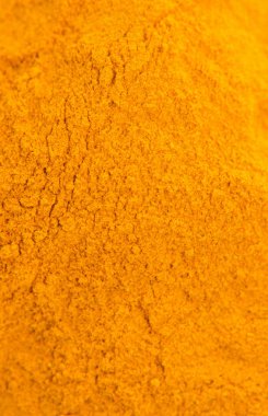 Kurutulmuş zerdeçal tepesinden görüntüleyin. Makro arka plan.