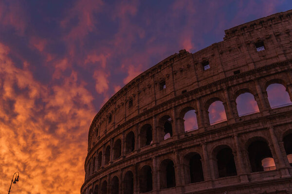 The Colosseum in flames, fabulous red sky | ROME, ITALY - 12 SEPTEMBER 2018.