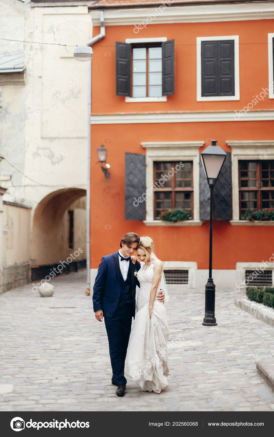 Luxury Wedding Couple Walking Old Building Square Light Stylish Bride Stock Photo Image By C Sonyachny 202560068