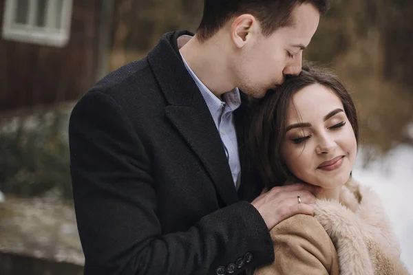 Gorgeous Bride Coat Stylish Groom Hugging Wooden House Wedding Couple — Stock Photo, Image