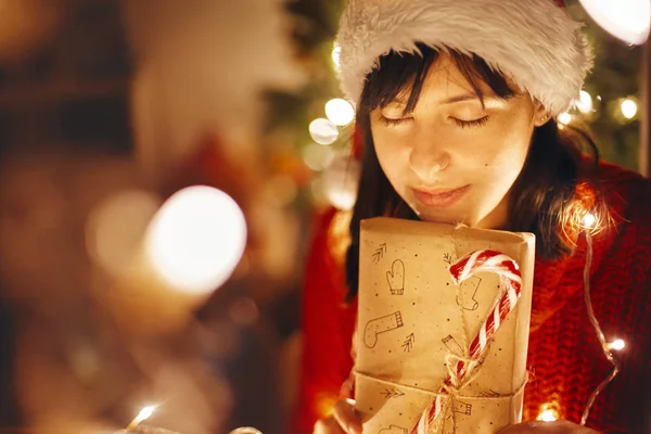 Christmas Magic Moments Girl Santa Hat Red Sweater Holding Christmas — Stock Photo, Image