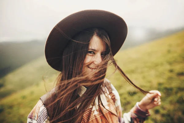 Stylish Traveler Hipster Girl Hat Backpack Holding Windy Hair Posing — Stock Photo, Image