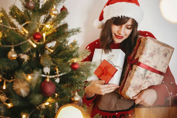 Happy Girl Santa Hat Holding Many Gift Boxes Golden Beautiful — Stock Photo, Image