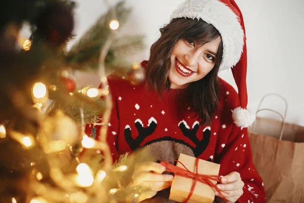 Happy Girl Santa Hat Holding Gift Box Golden Beautiful Christmas — Stock Photo, Image