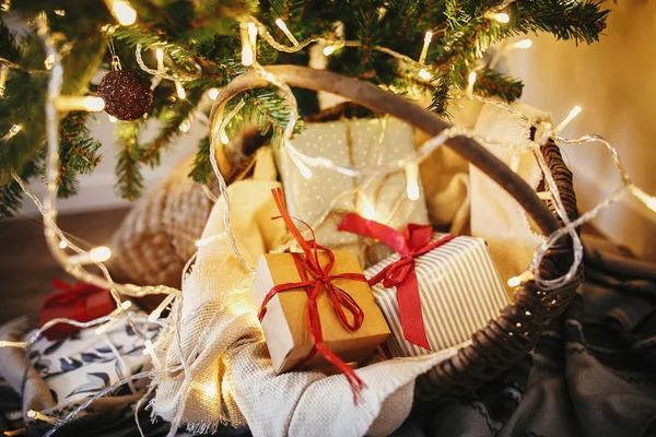 Stylish Rustic Christmas Gift Boxes Basket Christmas Tree Golden Lights — Stock Photo, Image