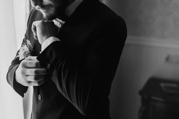 Stylish Groom Putting Suit Bow Tie Window Light Confident Happy — Stock Photo, Image