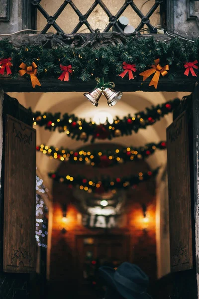 Stylish Christmas Decorations Jingle Bells Garland Lights Fir Branches Ornaments — Stock Photo, Image