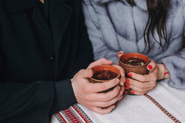 Stylish Couple Holding Cups Hot Tea Hands Wooden Porch Winter — Stock Photo, Image