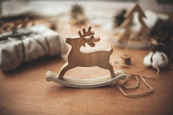 Rustic Reindeer Christmas Toy Wooden Table Background Lights Wooden Tree — Stock Photo, Image
