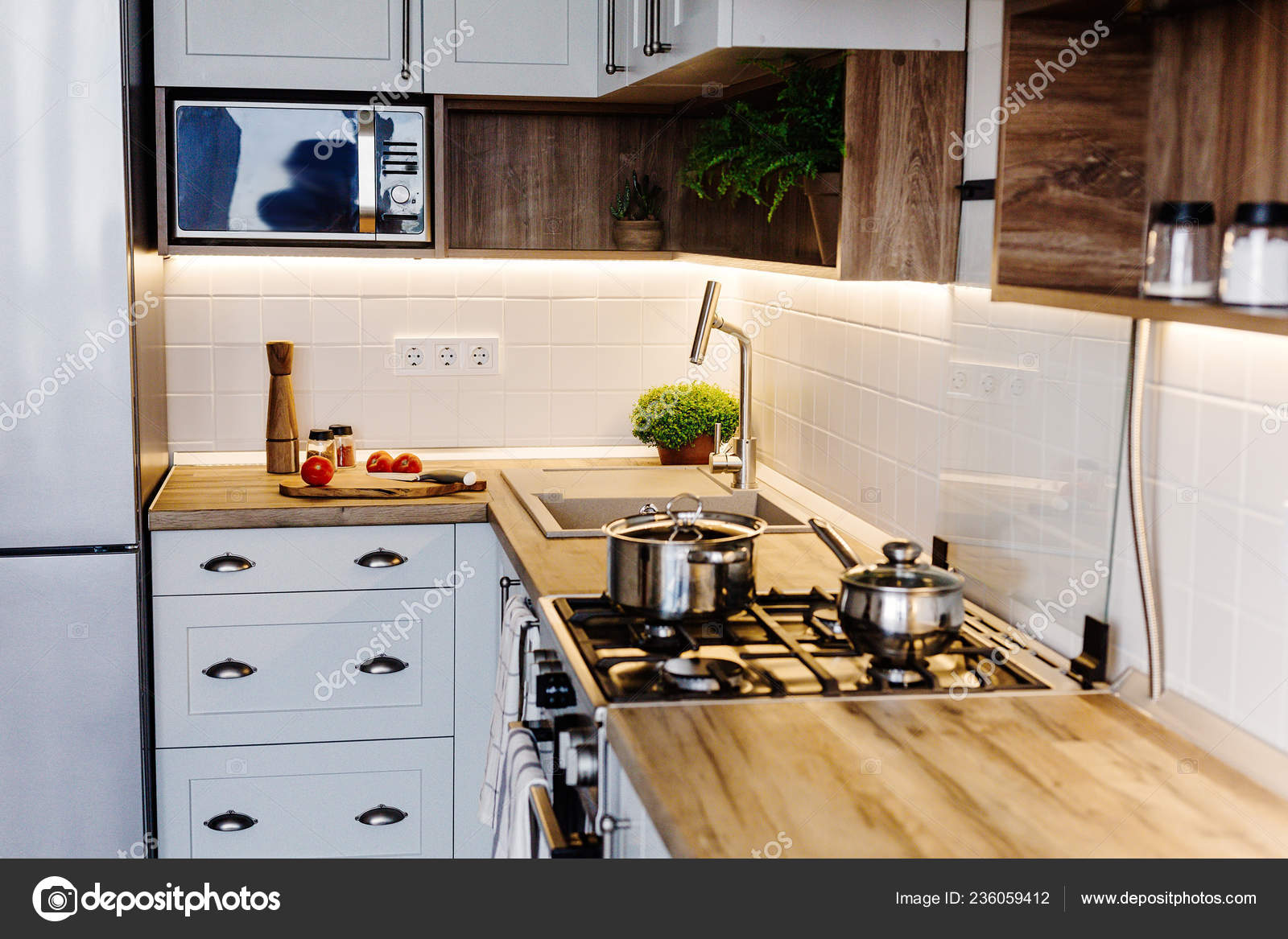 Cooking Food Modern Kitchen Steel Oven Pots Knife Stock Photo by