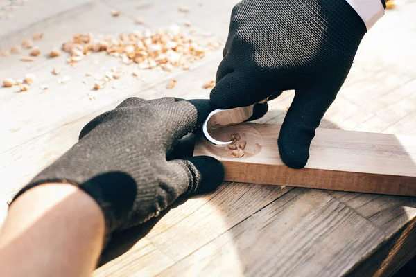 Wooden workshop. Hands carving spoon from wood, working with chi — Stock Photo, Image