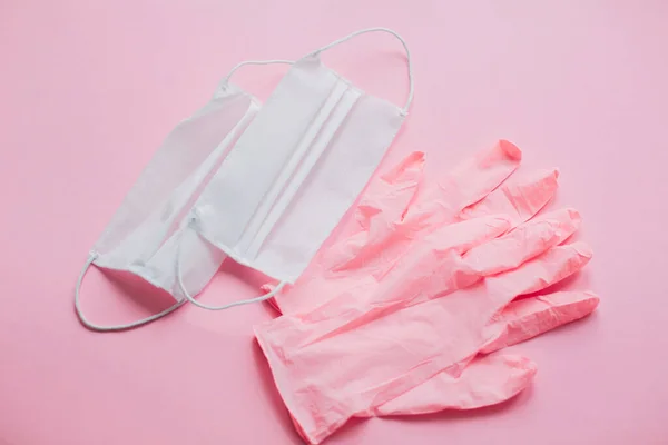 Розовые Перчатки Маска Лица Розовом Фоне Пандемия Коронавируса Береги Себя — стоковое фото
