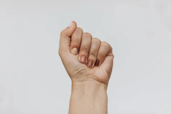 Puño Femenino Protestando Sobre Fondo Blanco Mano Femenina Levantada Con — Foto de Stock