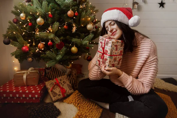 Stylish Young Woman Holding Christmas Gift Box Dreaming Christmas Tree — Stock Photo, Image